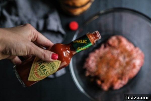 Crab-Crowned Cajun Burger with Pimento Gravy 3 The iconic Tabasco bottling facility on Avery Island, Louisiana