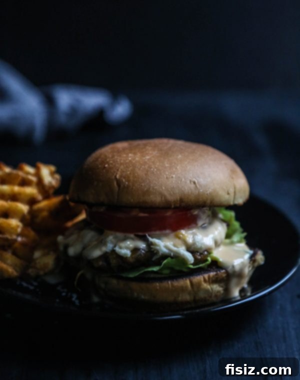 Crab-Crowned Cajun Burger with Pimento Gravy 8 A mouth-watering Crab Topped Cajun Burger, fully dressed and ready to be enjoyed