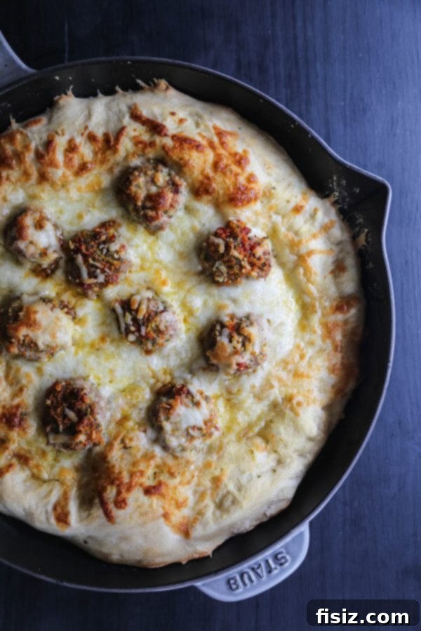 Delicious Chicken Meatball Banh Mi Skillet Pizza ready to be enjoyed.