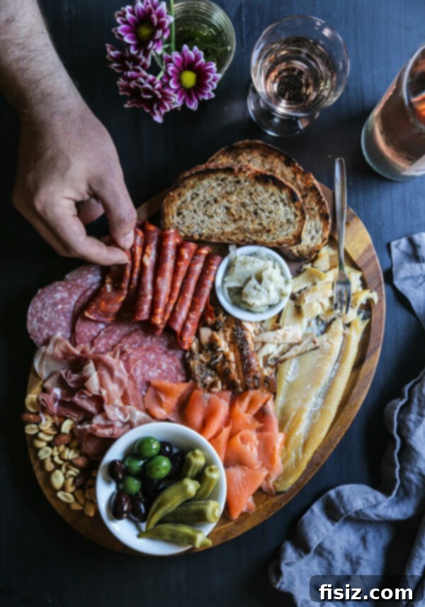 The Definitive Seafood and Charcuterie Board 2 The Ultimate Fish and Meat Board - Fresh fish, cured meats, and gourmet accompaniments for a memorable happy hour