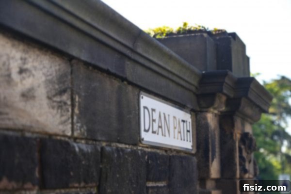 Edinburgh, Scotland: Unforgettable Stays, Delicious Eats, and Iconic Sights 19 Picturesque view of Dean Village with its historic buildings and tranquil water
