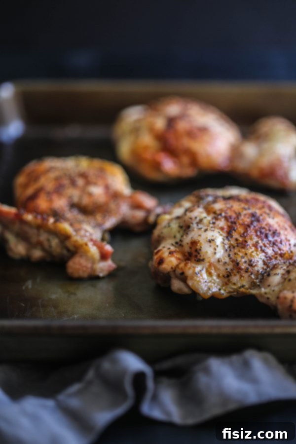 Zesty Ginger Jalapeno Bacon Chicken Sliders 3 Juicy chicken sliders with bacon and cheese, ready for serving