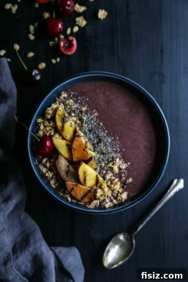Delicious Grilled Stone Fruit Acai Bowl with fresh toppings