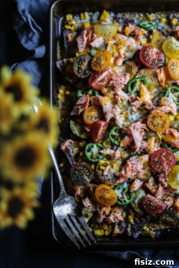 Market Fresh Sockeye Salmon Nachos 13 A plate of freshly prepared Farmers Market Sockeye Salmon Nachos, ready to be enjoyed.