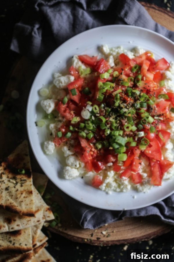 Effortless Mediterranean Zest Dip 5 Full spread of 5-Ingredient Mediterranean Dip with pita and serving ware