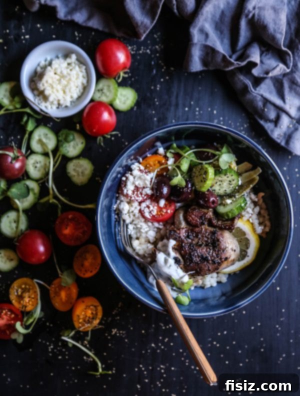 Mediterranean Grilled Lamb Souvlaki Bowls 5 Finished Grilled Lamb Souvlaki Bowls, beautifully arranged with fresh vegetables, feta, and couscous, inviting a delicious meal.