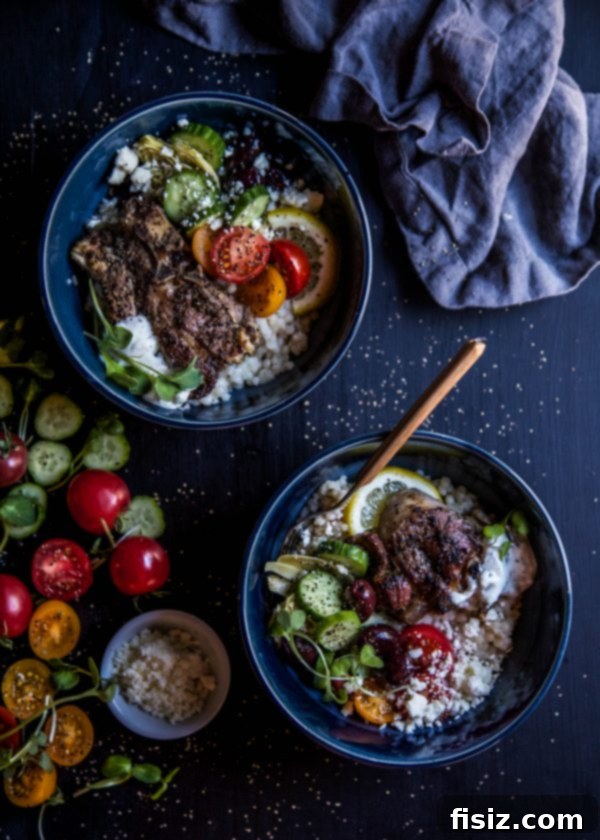 Mediterranean Grilled Lamb Souvlaki Bowls 7 A close-up shot of a single Grilled Lamb Souvlaki Bowl, highlighting the textures and vibrant colors of the ingredients.