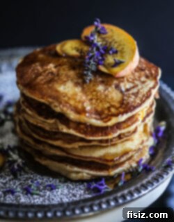 Decadent Peach and Bacon Pancakes with Lavender Butter Syrup 7 A stack of Peach and Bacon Pancakes with lavender butter syrup, ready to serve.