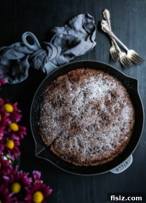 Indulgent Skillet Dark Chocolate Pumpkin Pancakes 4 Serving slice of Dark Chocolate Pumpkin Pancake Skillet, showcasing fluffy texture and chocolate chunks