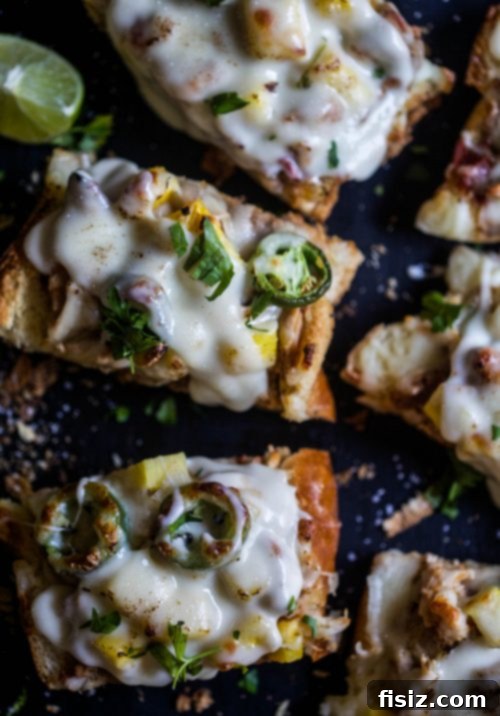 Tropical Pineapple Chicken French Bread with Rum Cheese Sauce 5 Assembling pineapple chicken French bread with rum cheese sauce for a delicious meal or appetizer