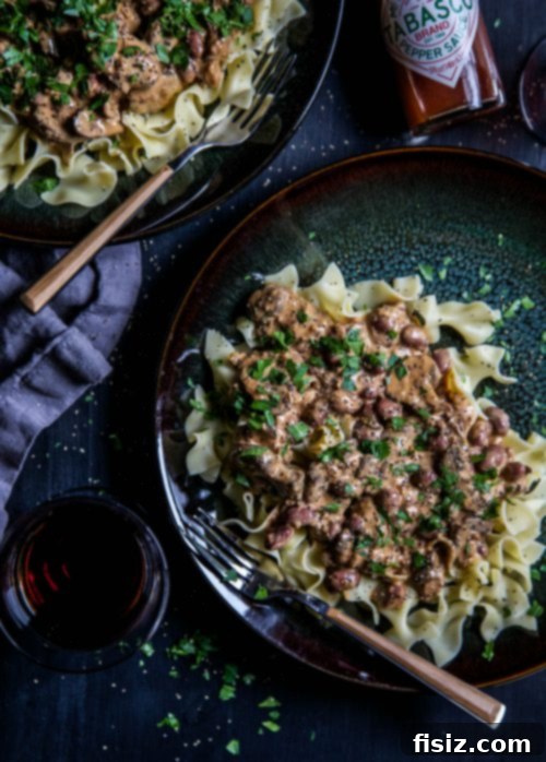 Hearty Cajun Chili Stroganoff 6 A bowl of Cajun Chili Stroganoff, garnished with parsley