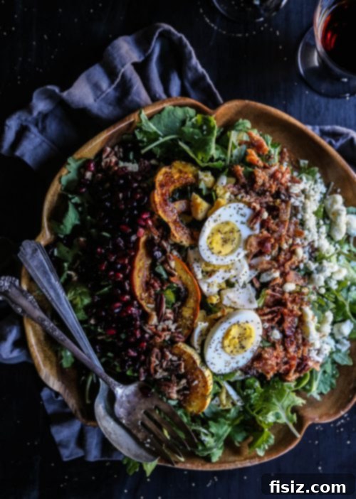 Golden Autumn Cobb: Kale, Brussels & Maple Drizzle 5 Maple Vinaigrette dressing drizzled over a fresh Autumn Kale and Brussels Sprout Cobb Salad, ready to be served
