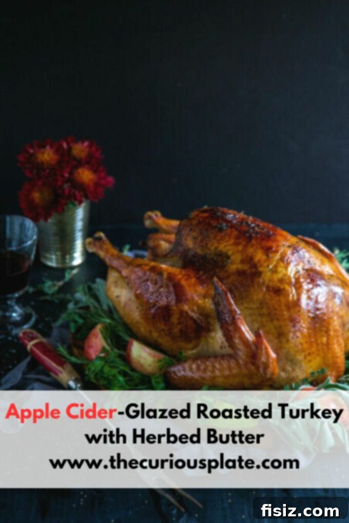 Golden Apple Cider Turkey with Aromatic Herb Butter 9 Beautifully roasted Apple Cider-Glazed Turkey, expertly carved and arranged on a platter for serving