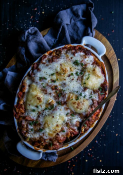 Delicious Butternut Squash Bolognese Pasta Bake with Melted Brie, perfect for potlucks and holiday gatherings