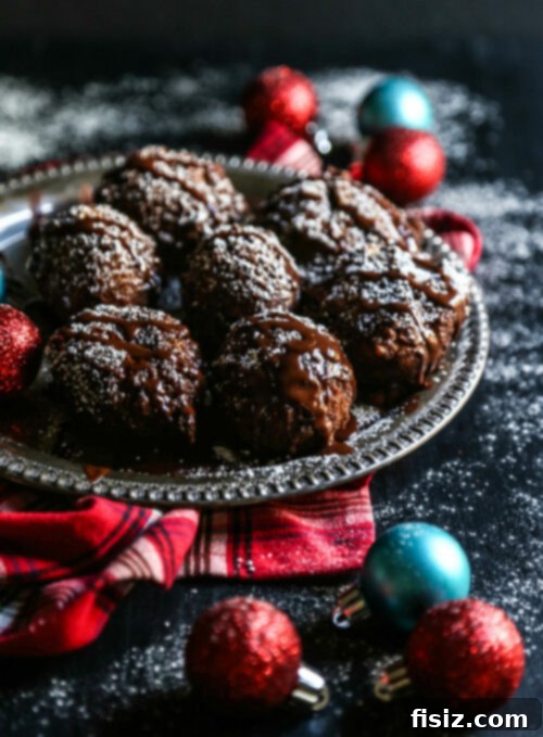 Rich Chocolate Mocha Gingerbread Fritters 2 Delicious Chocolate Mocha Glazed Gingerbread Fritters on a plate