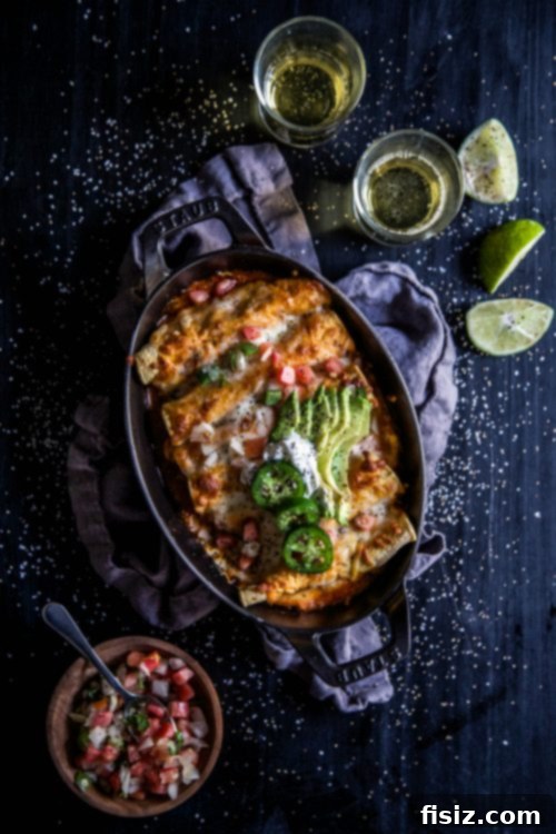 Braised Short Rib and Cheese Taquitos 5 Baked Cheesy Short Rib Stuffed Taquitos ready to serve with garnishes