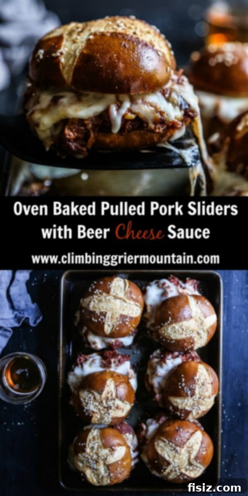 A close-up of a single Oven Baked Pulled Pork Slider with Beer Cheese Sauce, showcasing the gooey cheese and tender pork