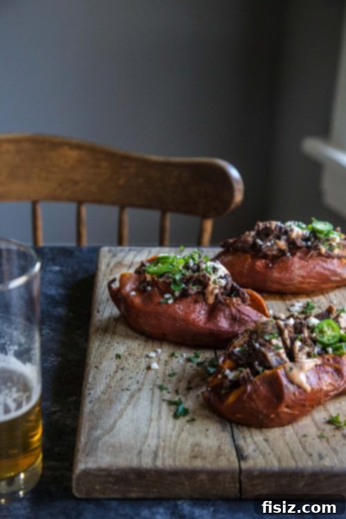 Korean BBQ Galbi Stuffed Sweet Potatoes 5 Rich Gochujang sauce coating beef short ribs for slow cooking