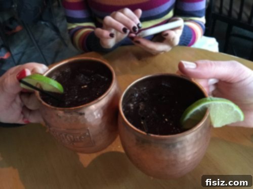 Solitude Mountain Resort Girls Ski Adventure 15 Friends enjoying drinks at Thirsty Squirrel