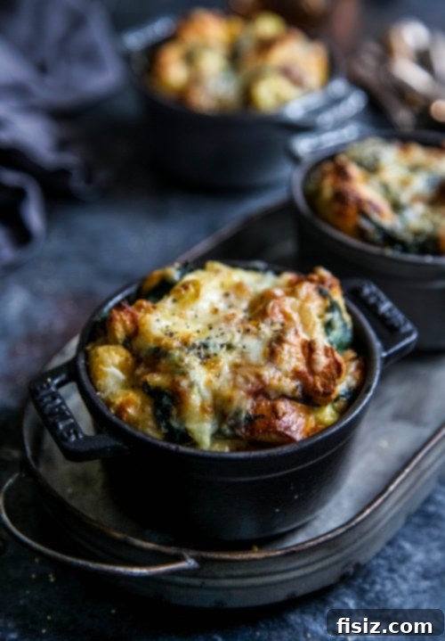 Mini Bacon Spinach and Artichoke Challah Bread Puddings 2 Mini Bacon Spinach Artichoke Challah Bread Puddings - overhead shot with ramekins
