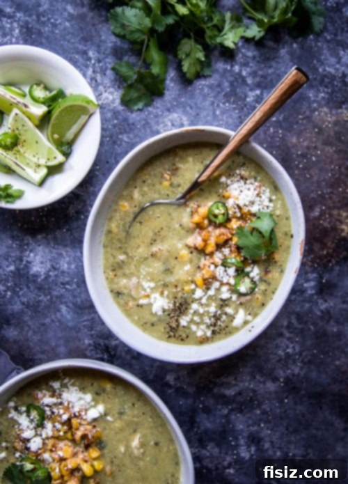 Street Corn Tortilla Soup 5 Ingredients for Mexican Street Corn Tortilla Soup laid out, including fresh corn, lime, cilantro, and spices, emphasizing fresh preparation.