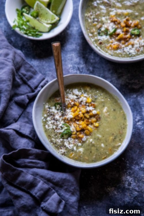 Street Corn Tortilla Soup 6 A vibrant and comforting bowl of Mexican Street Corn Tortilla Soup, garnished with cilantro and cheese, ready for a satisfying meal.