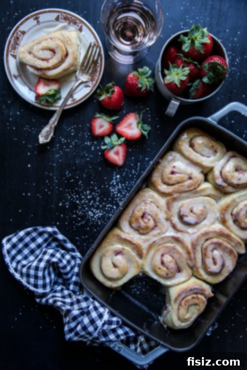 Easy Strawberry Cinnamon Rolls with Rosé Icing, freshly baked