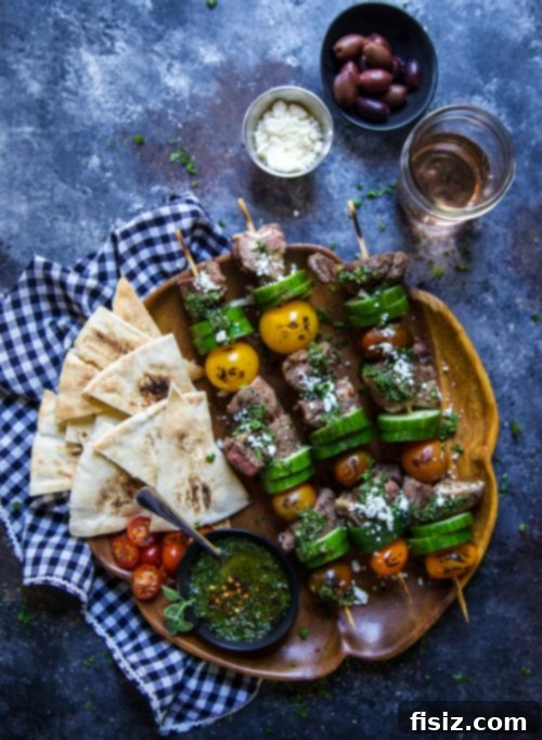 Succulent Lamb Kebabs with Zesty Anatolian Herb Relish 6 Grilled Lamb Skewers with Turkish Chimichurri on a plate