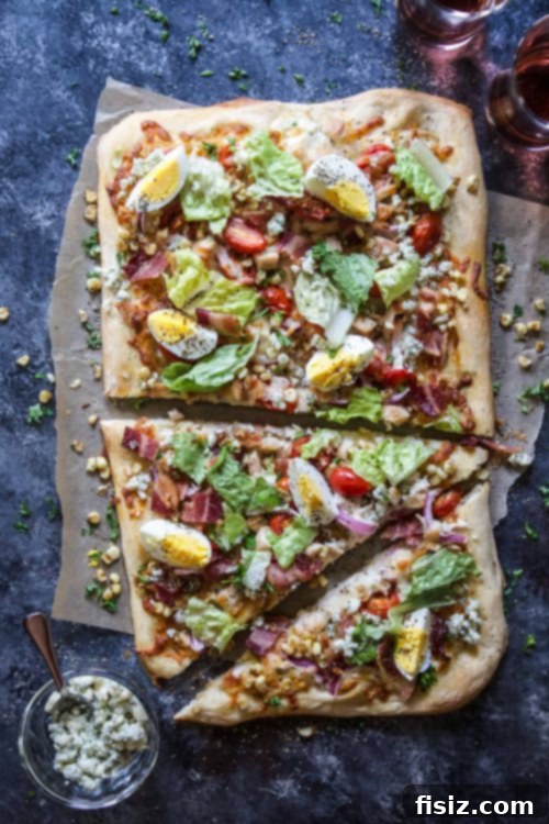 Close-up of Summer Cobb Salad Pizza with delicious toppings