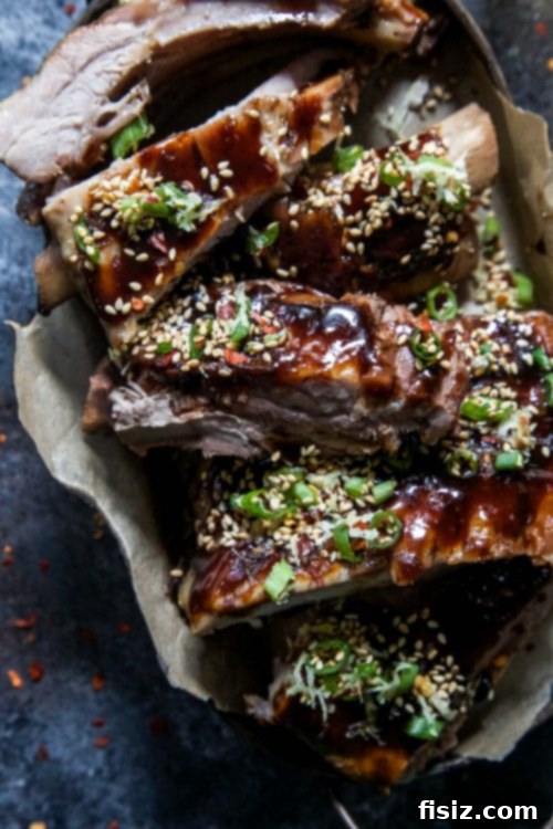Slow Cooker Asian-Style Ribs with vibrant sesame-citrus sprinkle