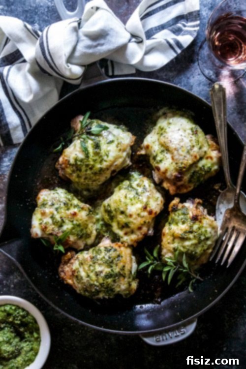 Crispy Skillet Chicken with Savory Miso Sesame Pesto 5 Chicken Thighs searing in cast iron skillet, skin side down