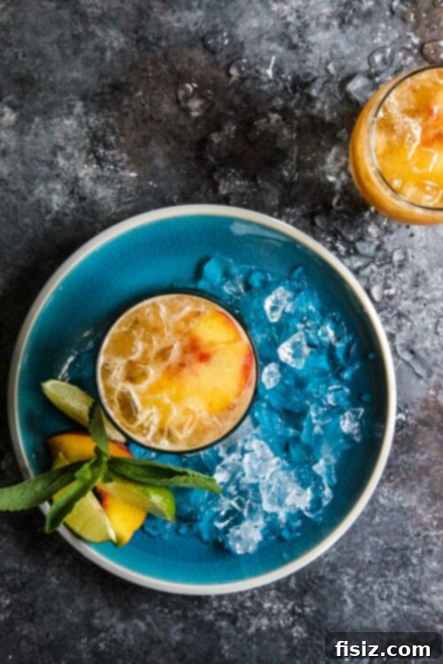 Sparkling Kombucha Peach Rum Punch 2 Refreshing Kombucha Peach Rum Punch for Summer Vacations