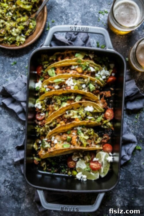 Tangy Al Pastor Chicken Tacos with Blistered Shishito Salsa 6 Al Pastor Baked Chicken Tacos garnished with avocado, cilantro, and shishito salsa