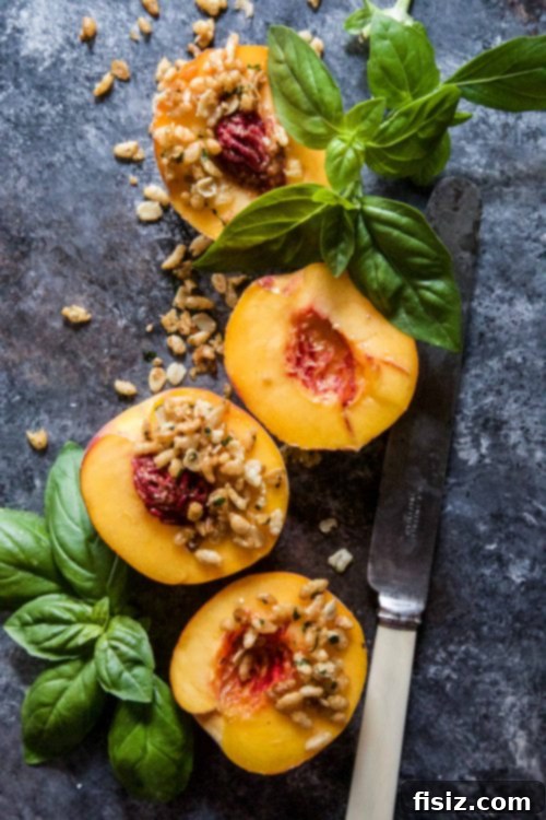 Peach Mousse with Crispy Basil Crumble 3 Two servings of Peach Mousse with Basil Krispie Crumble on a wooden board with fresh basil.