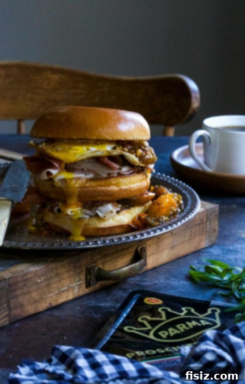 Gourmet Prosciutto Egg Sandwich with Tarragon Tomato 6 Assortment of dishes featuring Prosciutto di Parma, including a sandwich, pasta, and cheese plate