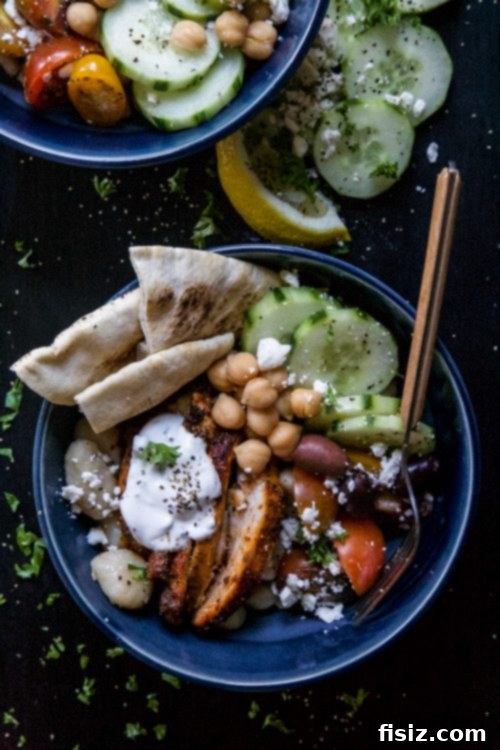 Chicken Shawarma Gnocchi Fusion 5 Chicken Shawarma Gnocchi Bowls with a generous dollop of tzatziki on top.