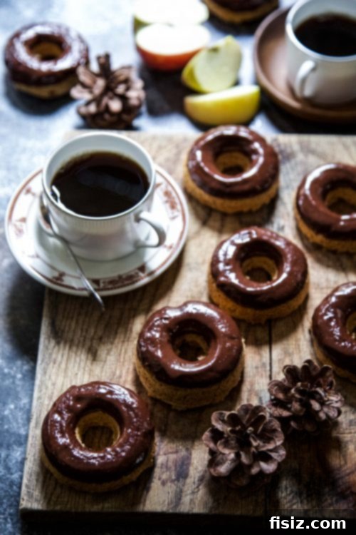Autumn Cider Doughnuts with Tahini Bourbon Chocolate Drizzle 5 Baked Cider Doughnuts Freshly Glazed