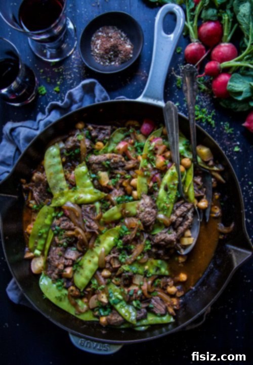 Zaatar Short Rib Stir Fry 6 Close-up of the delicious Za'atar Short Rib Stir-Fry, garnished with fresh herbs.
