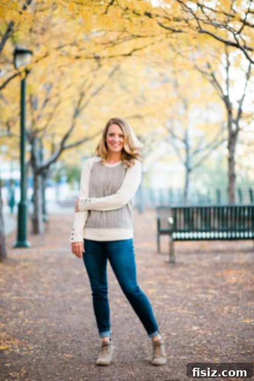 prAna 2017 Fall Line Style Guide 5 Woman showcasing the prAna Aya Sweater dressed up with jeans and booties for a casual work meeting.