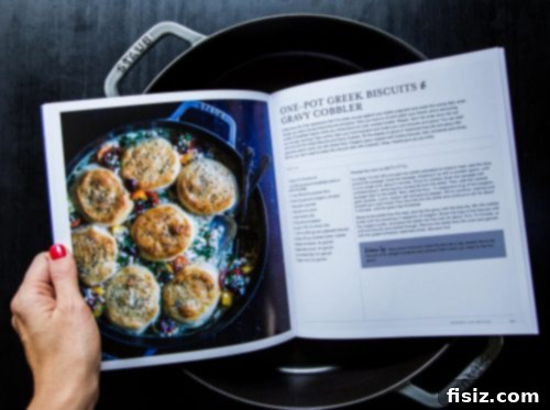 One-Pot Greek Biscuits and Gravy Cobbler 4 Staub Double Handle Fry Pan, a premium enameled cast iron skillet, perfect for cooking the One-Pot Greek Biscuits and Gravy Cobbler.