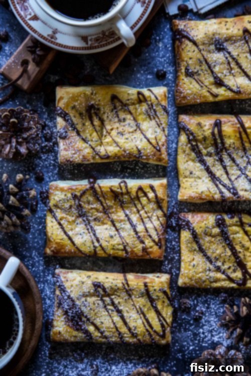 Maple Chocolate Glazed Pumpkin Coffee Danish 5 A baking sheet filled with freshly baked Pumpkin Coffee Danishes, golden brown and perfectly puffed, glistening before the icing is added.
