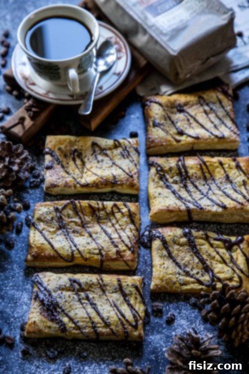 Maple Chocolate Glazed Pumpkin Coffee Danish 6 A hand gently dipping a corner of a Pumpkin Coffee Danish, adorned with chocolate maple icing, into a steaming mug of coffee, suggesting a delightful culinary experience.