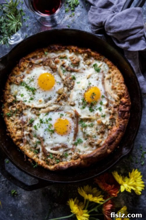 Post-Thanksgiving Dutch Baby Pizza 4 Close-up of Leftover Thanksgiving Dutch Baby Pizza with a golden crust and visible toppings