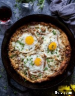 Post-Thanksgiving Dutch Baby Pizza 5 Leftover Thanksgiving Dutch Baby Pizza, a golden crust topped with turkey, stuffing, cheese, and eggs