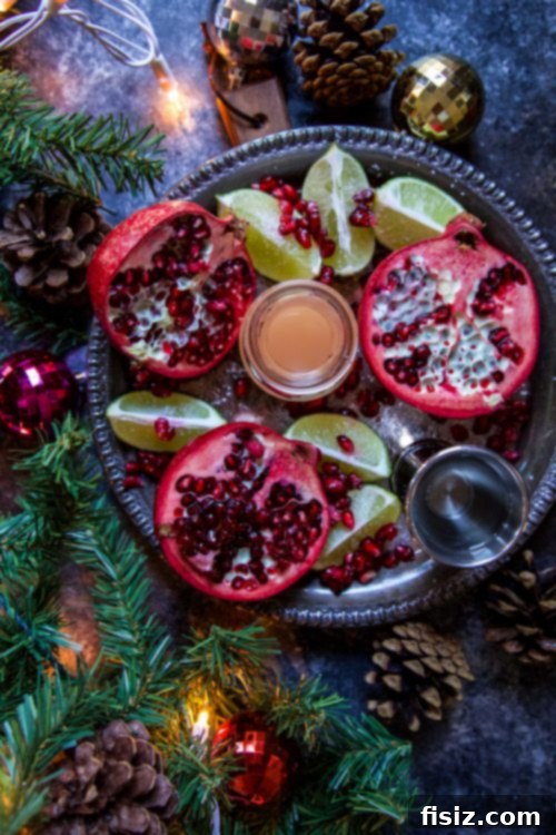 Crimson Ginger Paloma 3 A festive Ginger Pomegranate Paloma cocktail ready to be enjoyed at a launch party