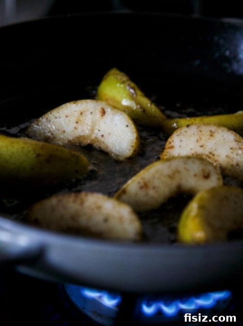 Sauteed Pears with Bacon and Blue Cheese Giveaway 4 Fresh pears waiting to be sauteed, highlighting their natural beauty and readiness for cooking