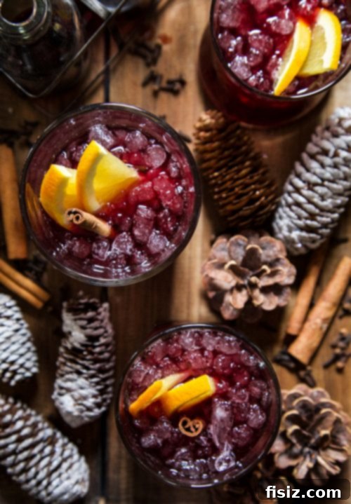 Ruby Spiced Sparkle Punch 4 Friends gathered around a table inside a cozy yurt