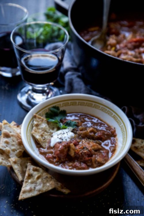 Rich Tomato Chicken Curry with Crispy Garlic Lavash 4 Fresh ingredients for a healthy Tomato Chicken Curry, including red onion, ginger, garlic, tomatoes, and lavash bread.