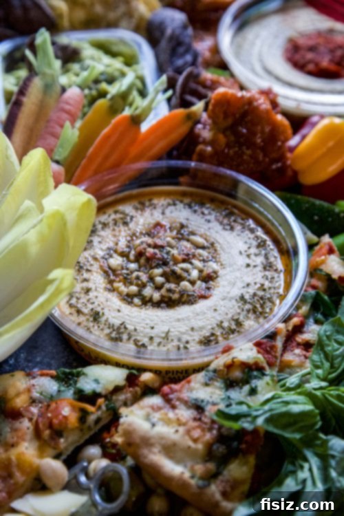 Hummus Board with various dippers and toppings