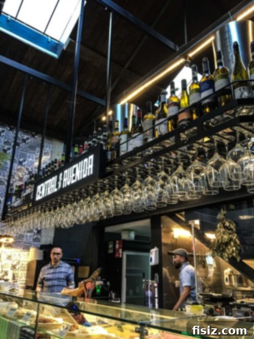 Lisbon Revealed: Your Guide to Stays, Bites, and Sights 19 Modern interior of Central da Avenida restaurant with stylish lighting